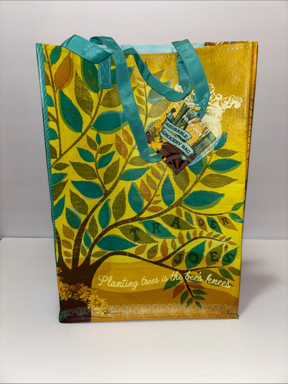 Trader Joe's Yellow & Teal Reusable Tote Bag. Nebraska and 🐝 Bee’s knees Tree.
